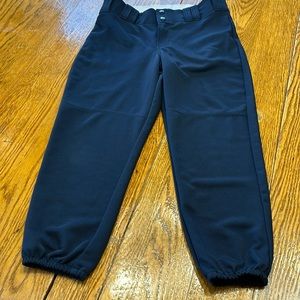 Teamwork brand navy blue softball pants.  Size 30-33.  Back pockets. Zip/snap.